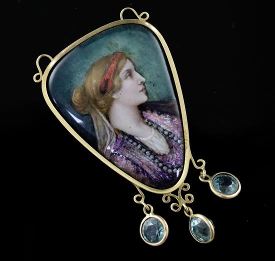 An early 20th century French Pierre Bonnaud Art Nouveau gold mounted enamelled Limoges pendant with three green sapphire drops,